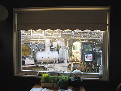 Drilling truck as seen from inside house.